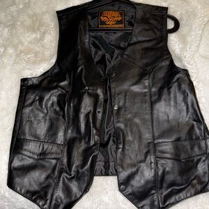 Black a leather vest.